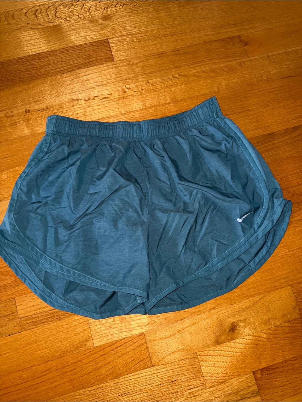 Teal NIKE running shorts
